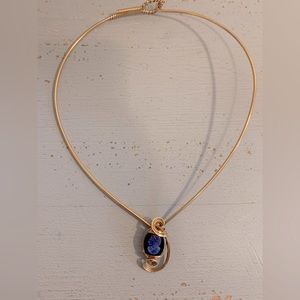 Gold necklace with unique blue cameo pendant